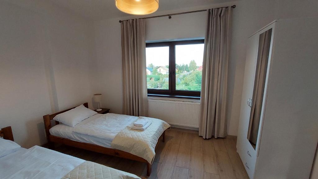 Posteľ alebo postele v izbe v ubytovaní Apartamenty Starowiejska 39, Ryczów - 10km od Zator Energylandia