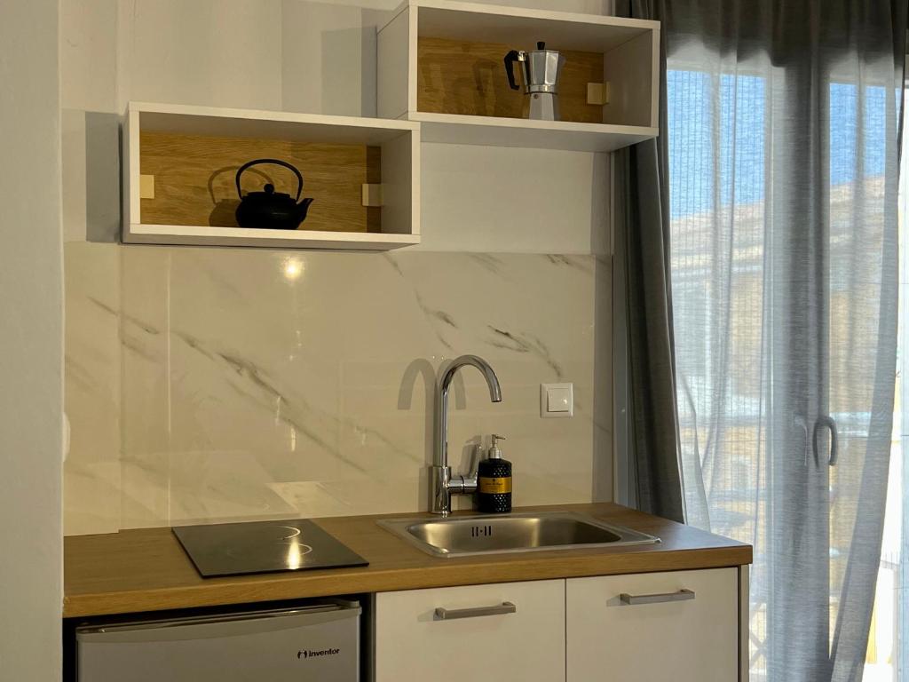 Kuchyň nebo kuchyňský kout v ubytování Issos Residence