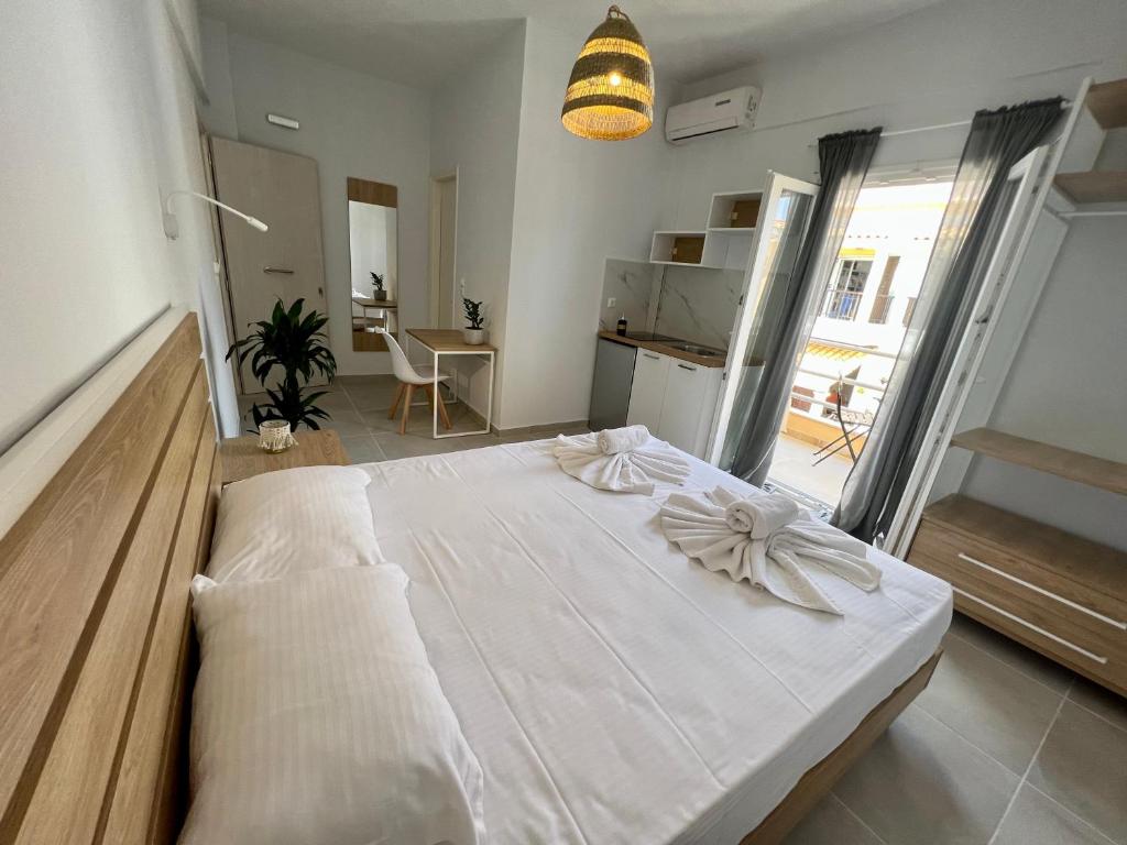 Postel nebo postele na pokoji v ubytování Issos Residence