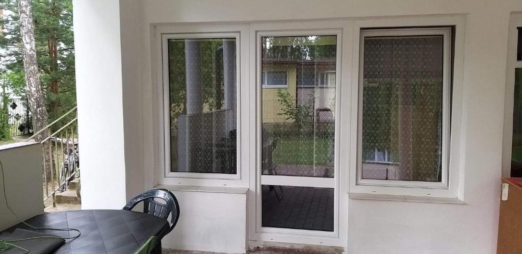 Posedenie v ubytovaní Apartamenty jezioro Białe