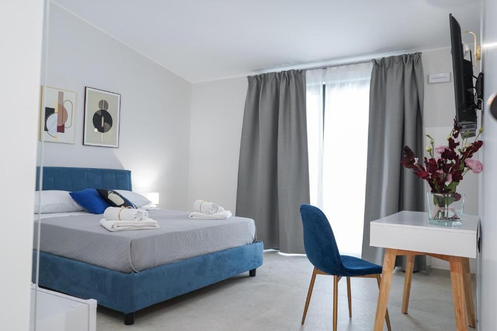 Postel nebo postele na pokoji v ubytování Thalassa Rooms