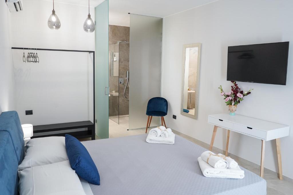 TV a/nebo společenská místnost v ubytování Thalassa Rooms