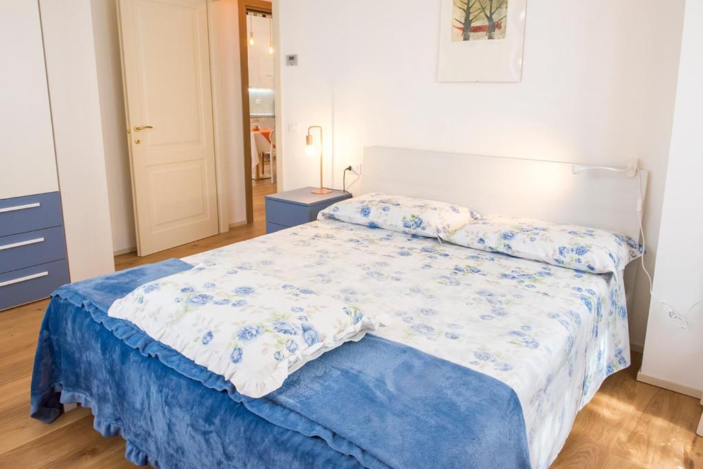 Postel nebo postele na pokoji v ubytování Casa del Fattore