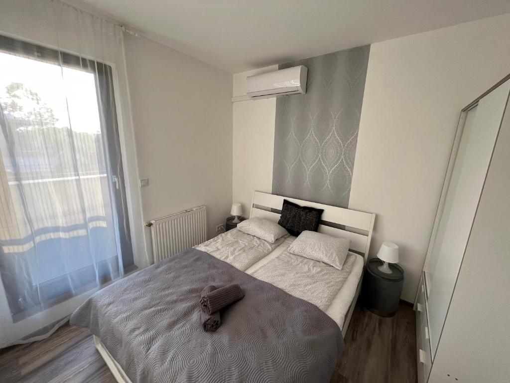 Postel nebo postele na pokoji v ubytování ZMRD Resort