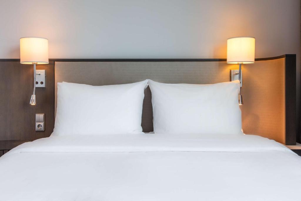 Postel nebo postele na pokoji v ubytování Radisson Blu Hotel Uppsala