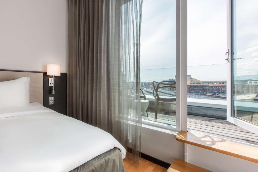 
Standard Room with City View and Balcony
