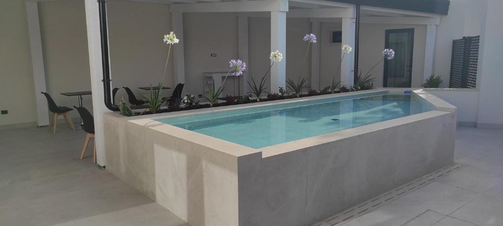 Bazén v ubytování Thalassa Rooms nebo v jeho okolí