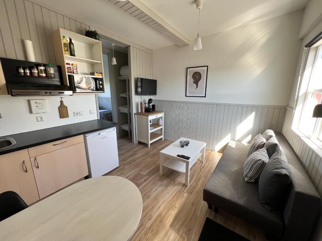 Kuchyň nebo kuchyňský kout v ubytování Garður Apartments