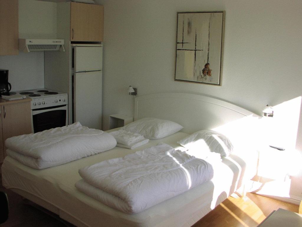 Postel nebo postele na pokoji v ubytování Skagen Apartment