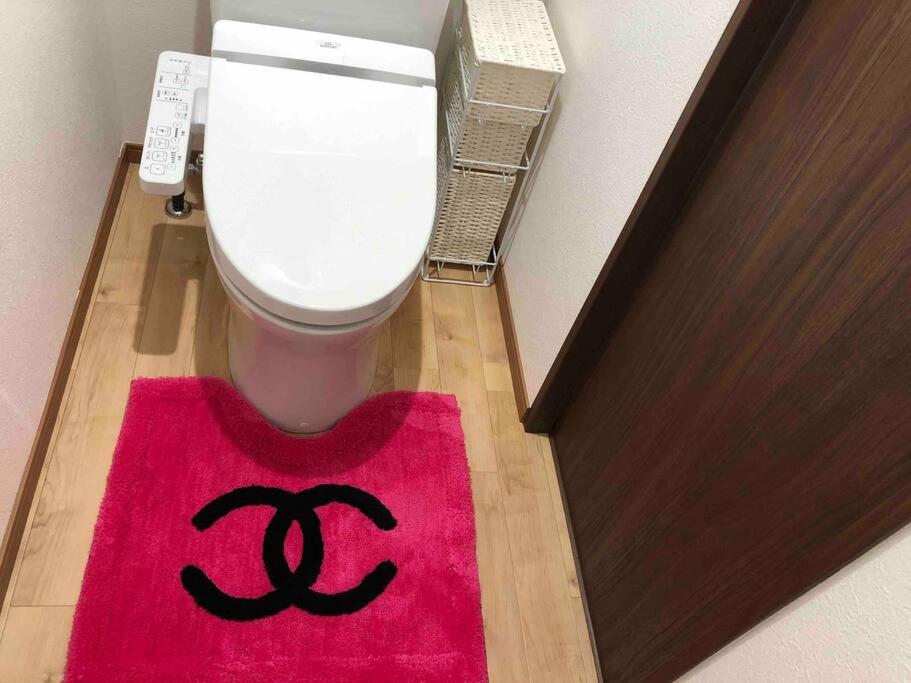 pink chanel bathroom rug set