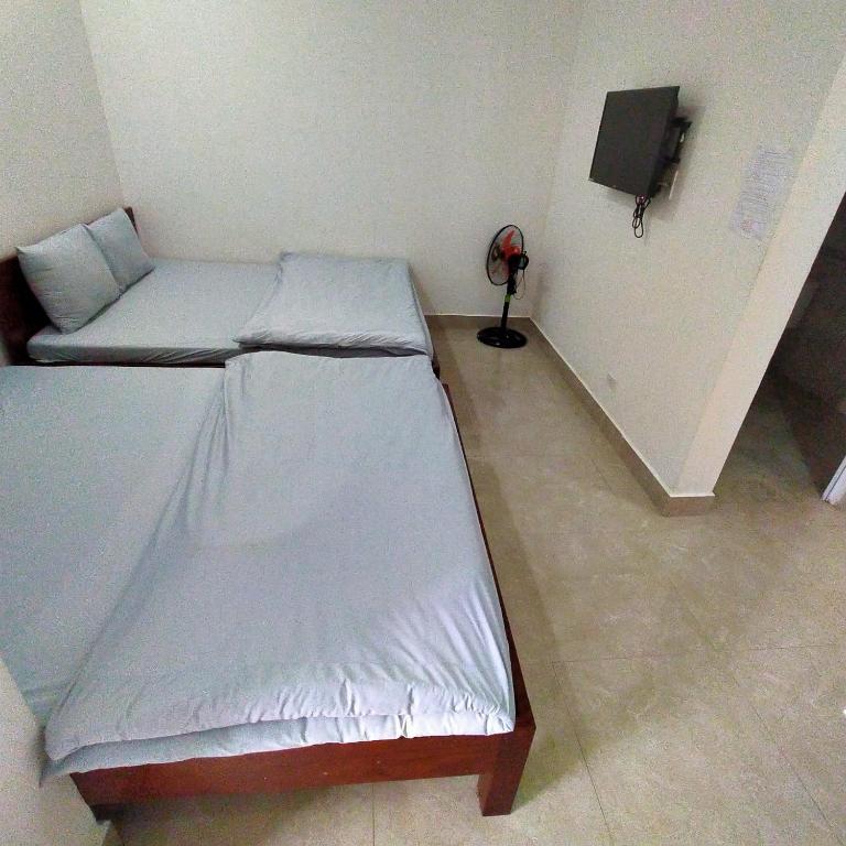 Postel nebo postele na pokoji v ubytování Phuong Vy 2