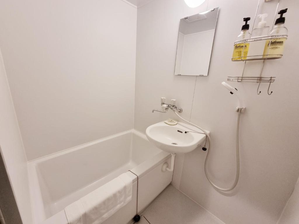 Kúpeľňa v ubytovaní KYU KYU HOTEL