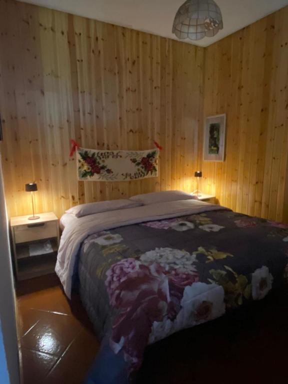 Łóżko lub łóżka w pokoju w obiekcie Parco gran paradiso