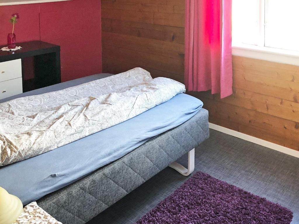 Postel nebo postele na pokoji v ubytování Holiday home Utvik II