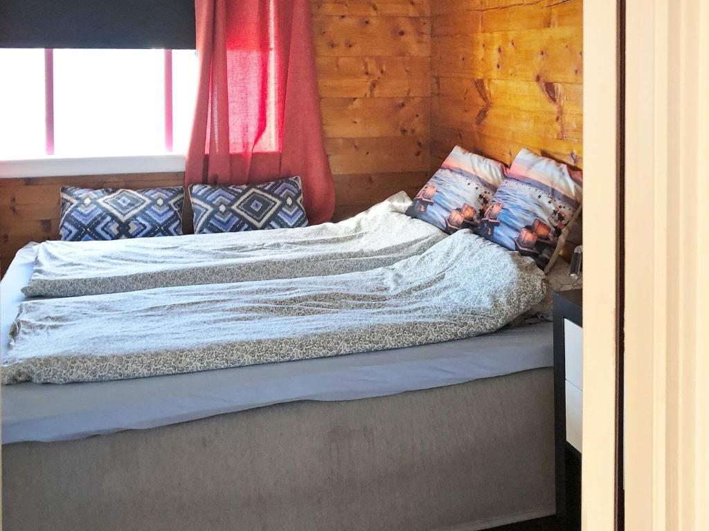 Postel nebo postele na pokoji v ubytování Holiday home Utvik II
