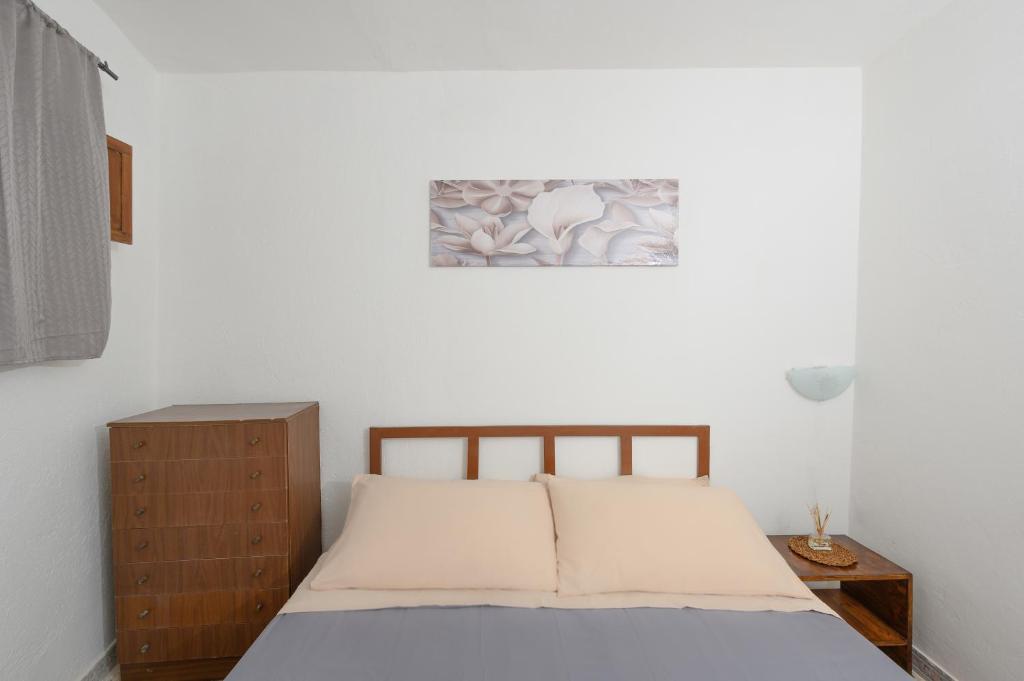 Postel nebo postele na pokoji v ubytování Salento incantevole alloggio fronte mare