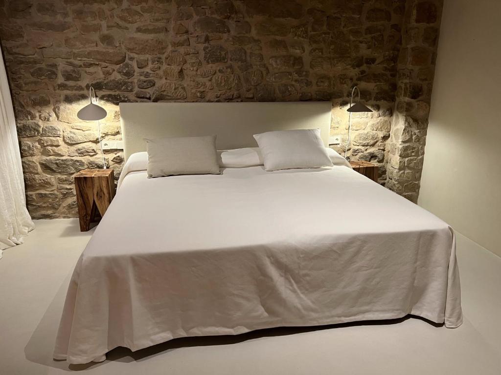 Postel nebo postele na pokoji v ubytování Casa ROBLA