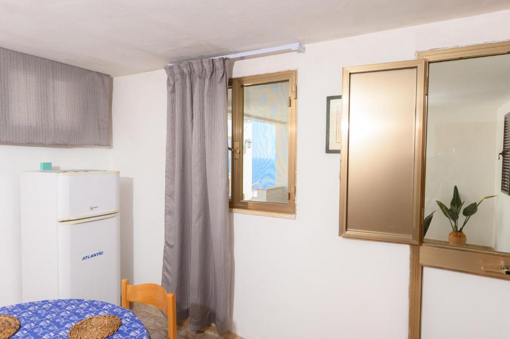 Kuchyň nebo kuchyňský kout v ubytování Salento incantevole alloggio fronte mare