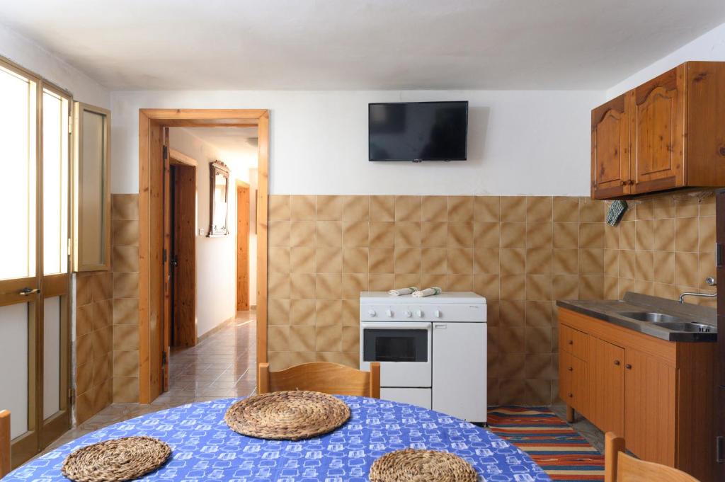 Kuchyň nebo kuchyňský kout v ubytování Salento incantevole alloggio fronte mare