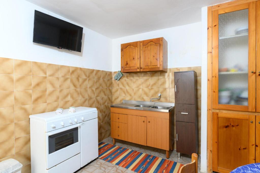 Kuchyň nebo kuchyňský kout v ubytování Salento incantevole alloggio fronte mare