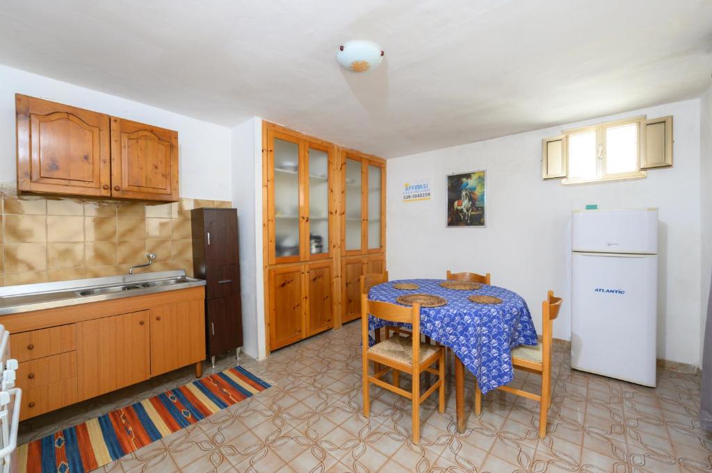 Kuchyň nebo kuchyňský kout v ubytování Salento incantevole alloggio fronte mare