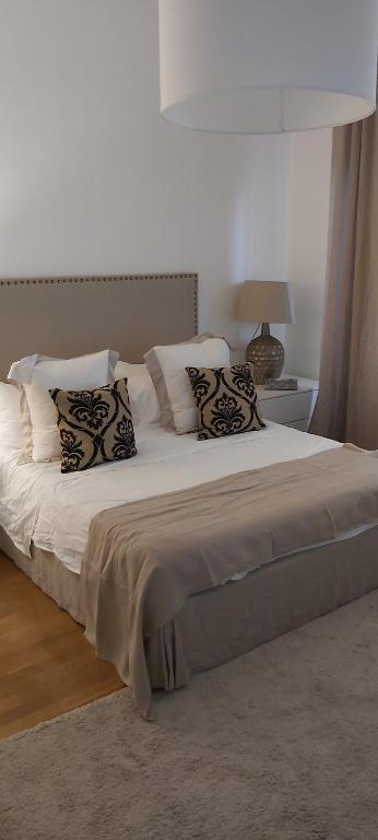 En eller flere senge i et værelse på Palermo eleganza in centro città