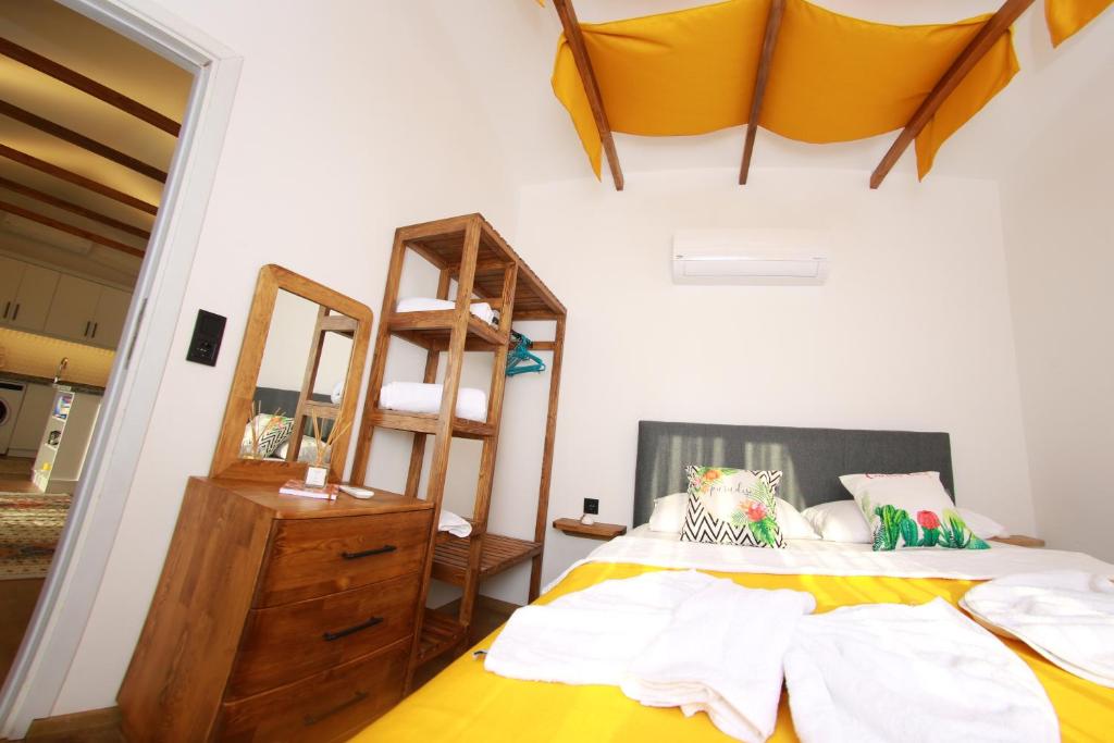 Postel nebo postele na pokoji v ubytování Tiny House Cactus söğüt