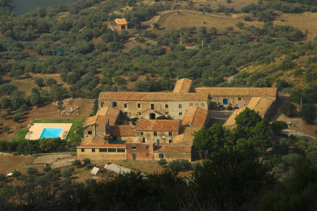 an aerial view of a house on a hill at Il Vecchio Frantoio in Scillato