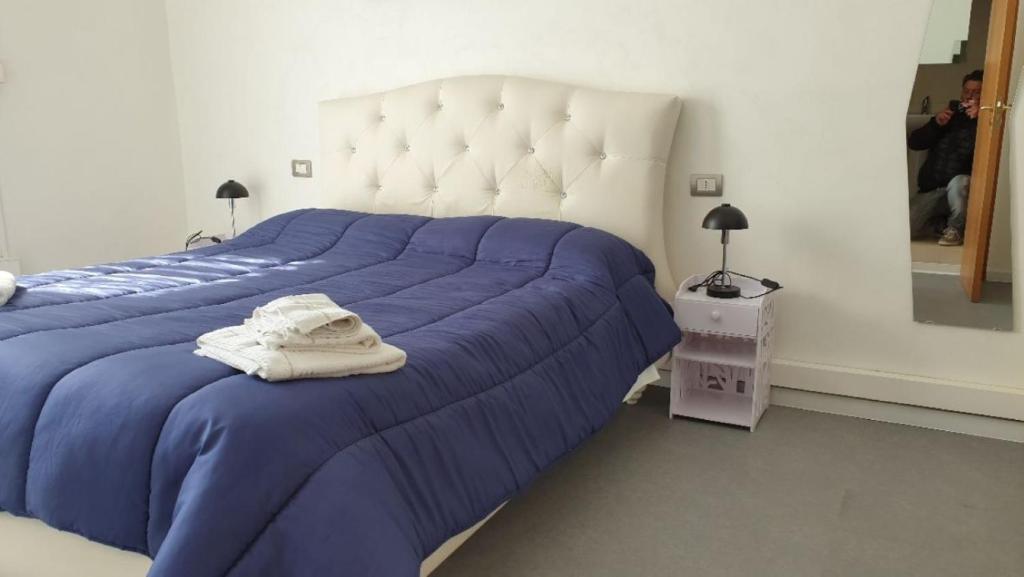 Posteľ alebo postele v izbe v ubytovaní MADB&B