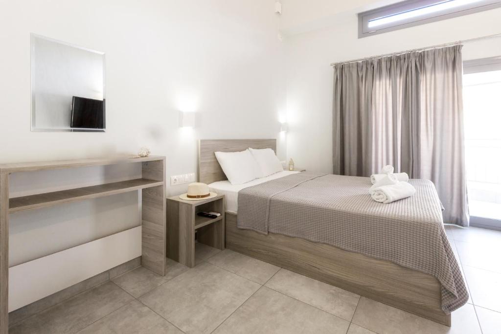 Posteľ alebo postele v izbe v ubytovaní Summer Inn