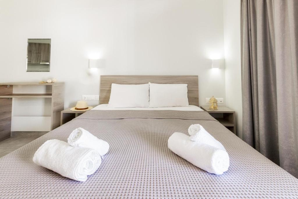 Posteľ alebo postele v izbe v ubytovaní Summer Inn