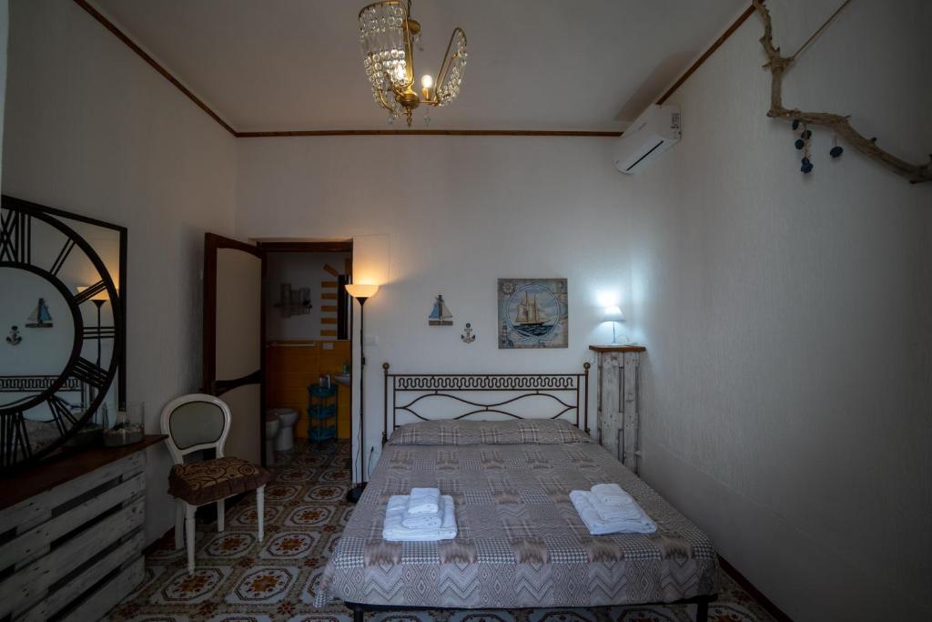 Postel nebo postele na pokoji v ubytování Dimora il Cereus