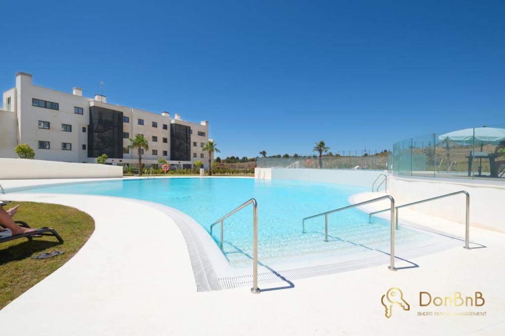 Bazén v ubytovaní Exclusive apartment in Higueron west 217 in Fuengirola alebo v jeho blízkosti