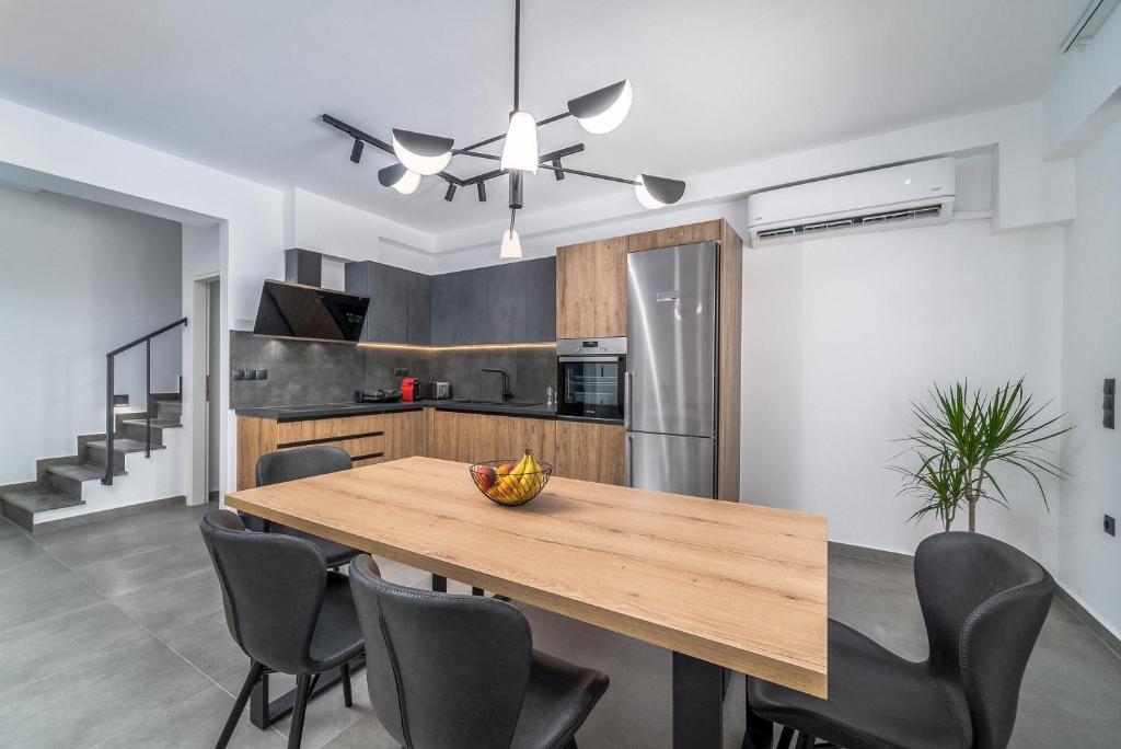 Kuchyňa alebo kuchynka v ubytovaní Nemesis Luxury Villas