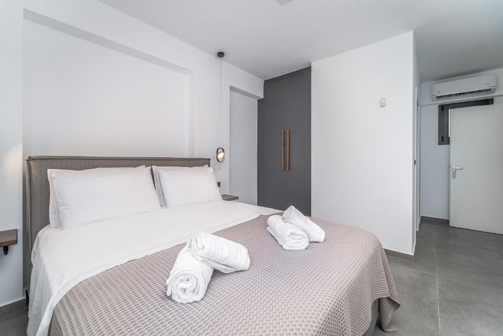 Posteľ alebo postele v izbe v ubytovaní Nemesis Luxury Villas
