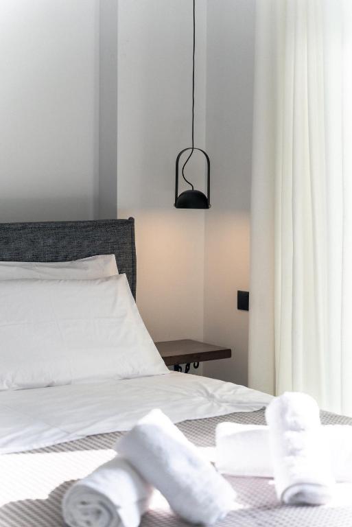 Posteľ alebo postele v izbe v ubytovaní Nemesis Luxury Villas
