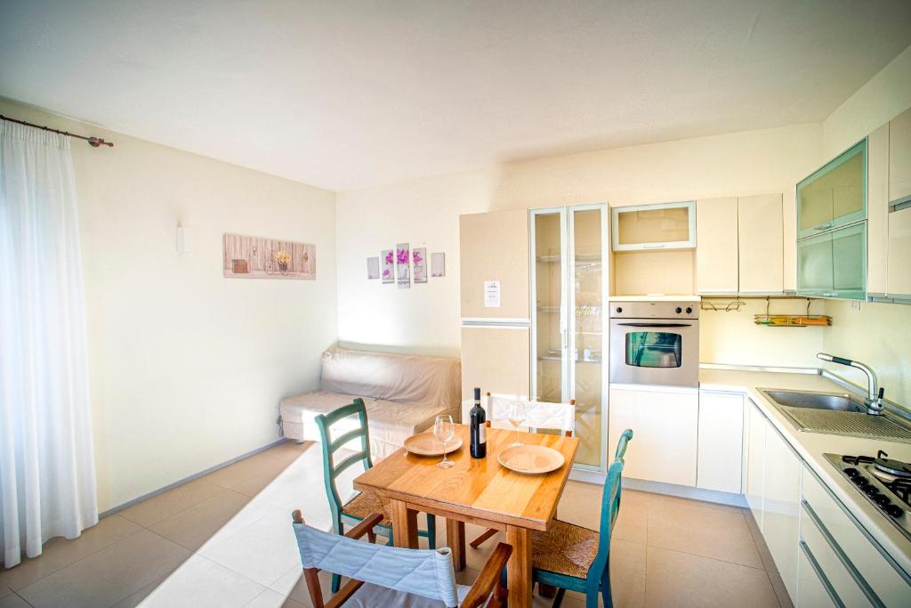 Kuchyň nebo kuchyňský kout v ubytování Hotel Villaggio Le Stelline