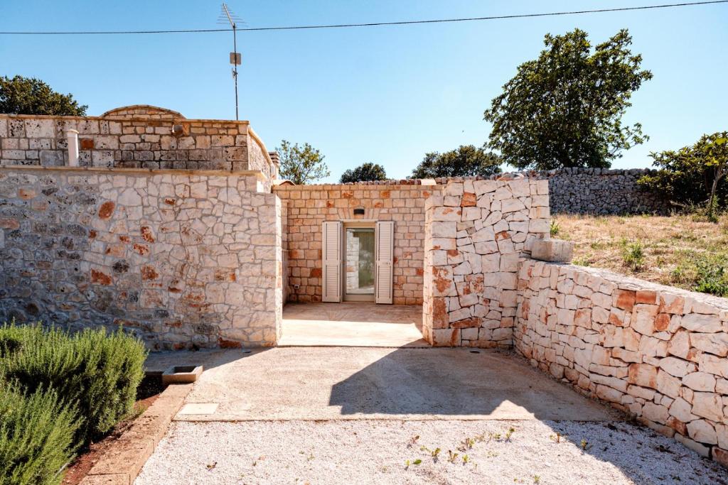 Kép HelloAPULIA Typical Cottage Lamia delle Murge - Private Pool & Scenic Hilltop Retreat - Pet friendly szállásáról Ostuniban a galériában