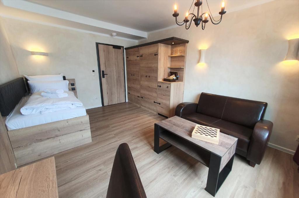 Postel nebo postele na pokoji v ubytování R&R Hotel Störtebeker