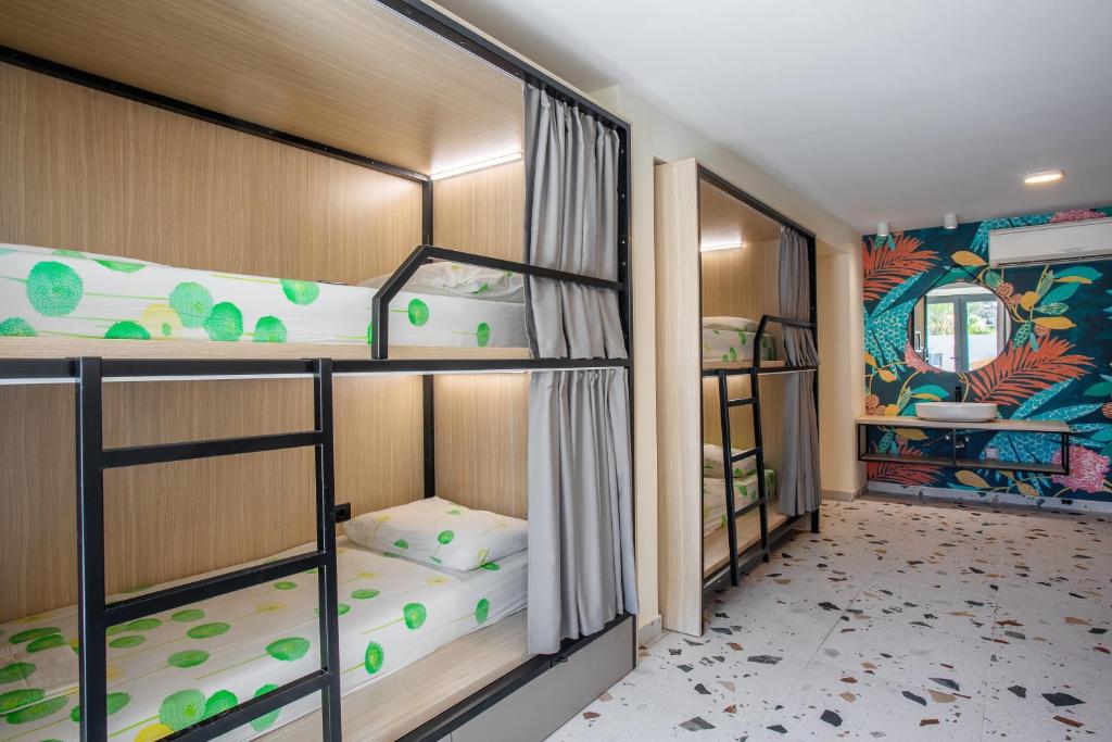 Postel nebo postele na pokoji v ubytování Hostel Villa Skansi