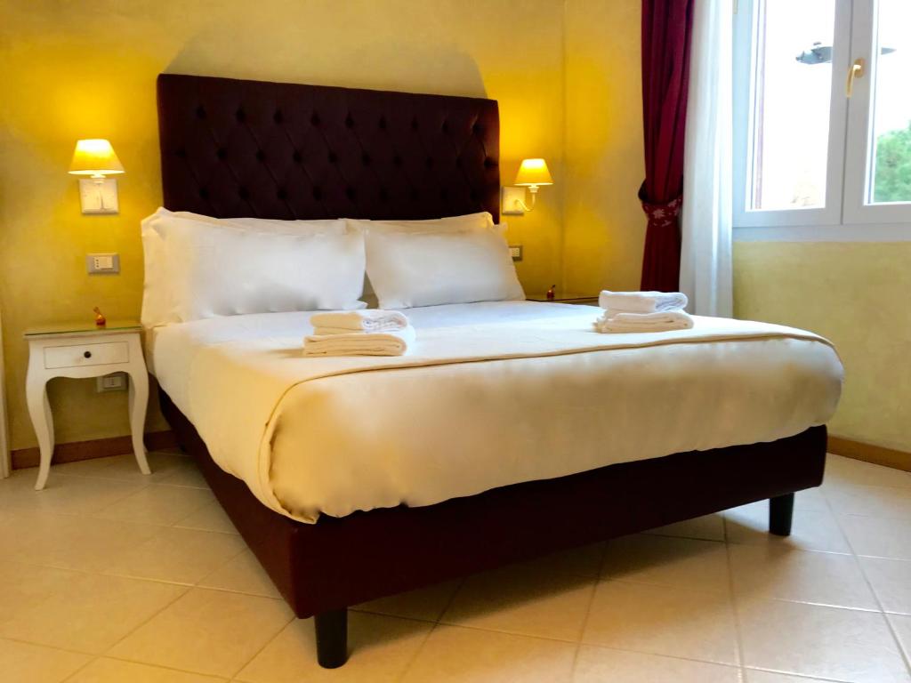 Posteľ alebo postele v izbe v ubytovaní Guest House Le Contesse