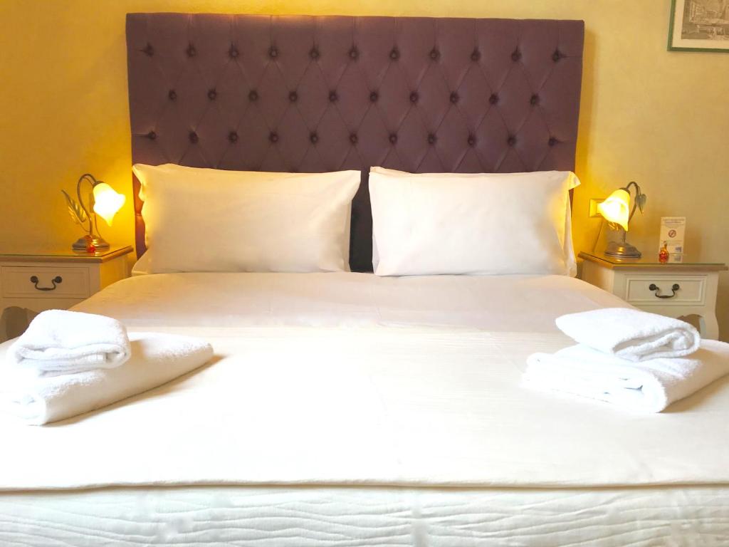 Posteľ alebo postele v izbe v ubytovaní Guest House Le Contesse