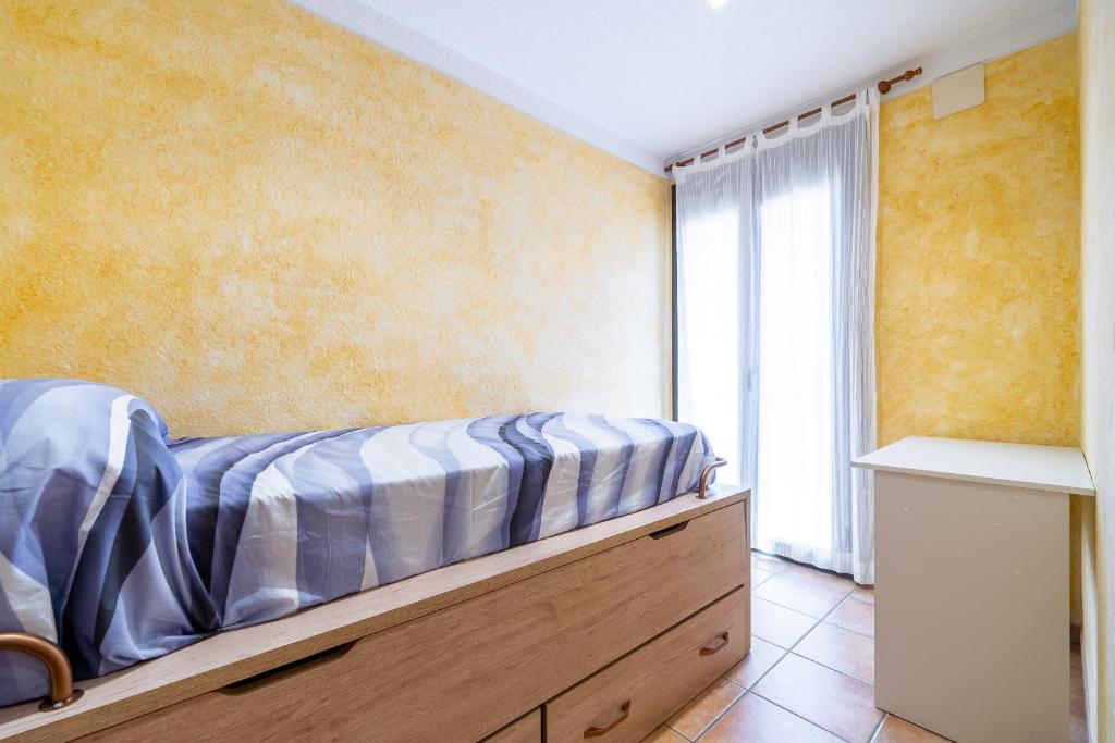 Postel nebo postele na pokoji v ubytování Hauzify I Casa Sant Gregori