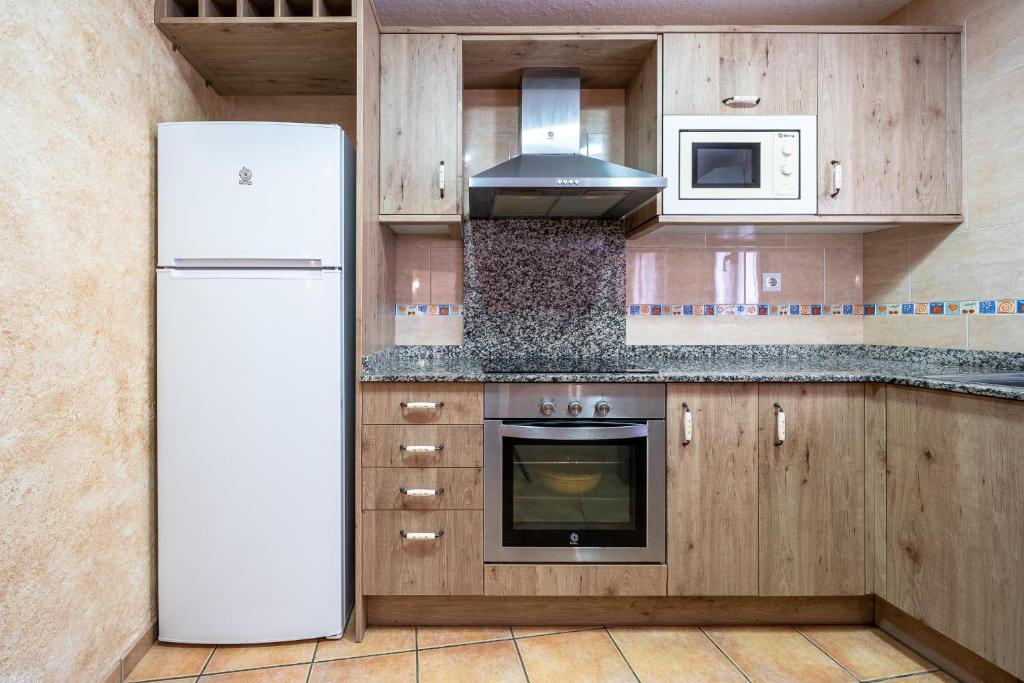 Kuchyň nebo kuchyňský kout v ubytování Hauzify I Casa Sant Gregori