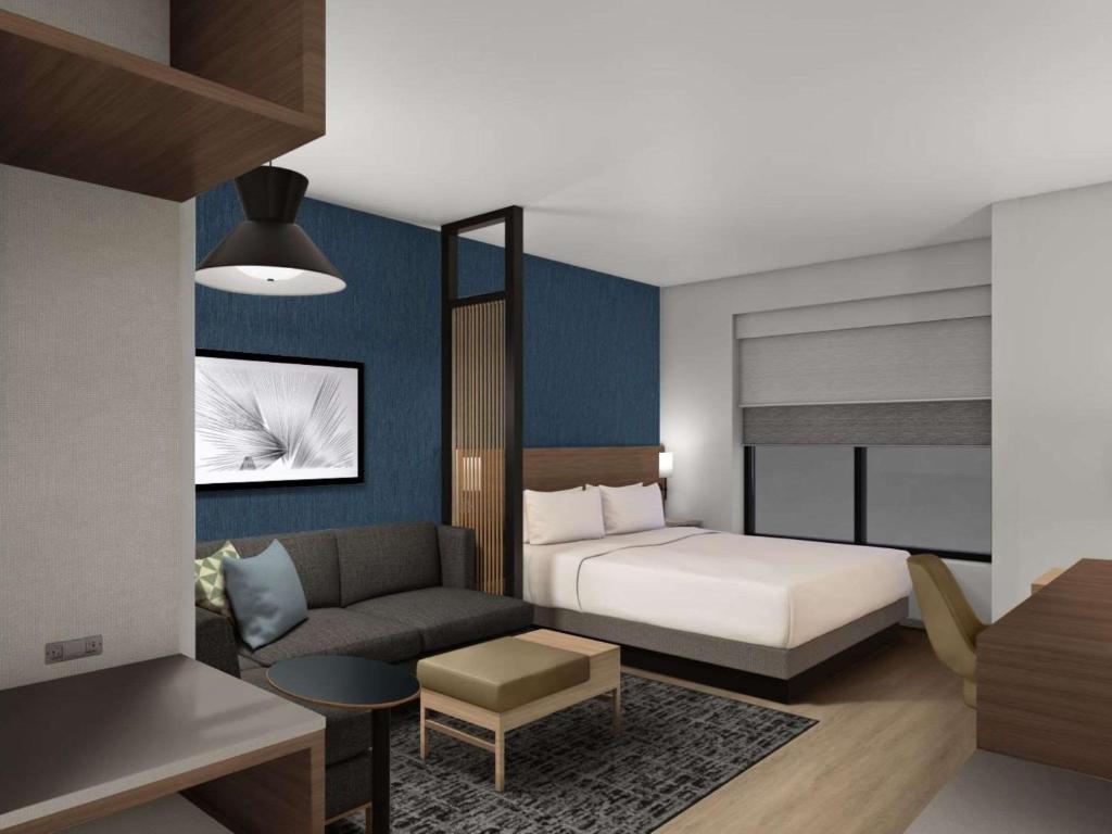 Postel nebo postele na pokoji v ubytování Hyatt Place Phoenix/Downtown