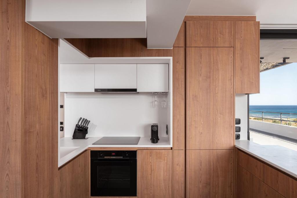 Kuchyň nebo kuchyňský kout v ubytování Sounio Panoramic Loft