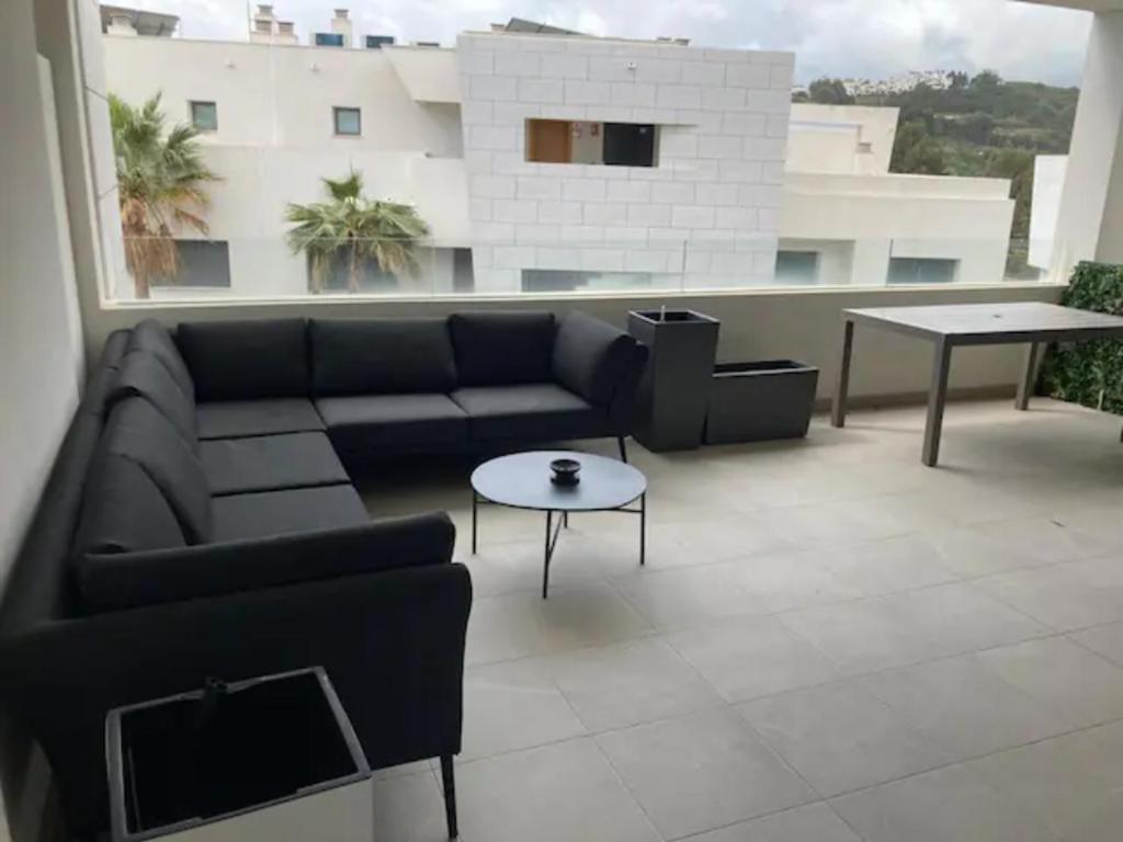 Posedenie v ubytovaní Appartement Casares - Mer, Golf, Piscine, Padel - FINCA CORTESIN