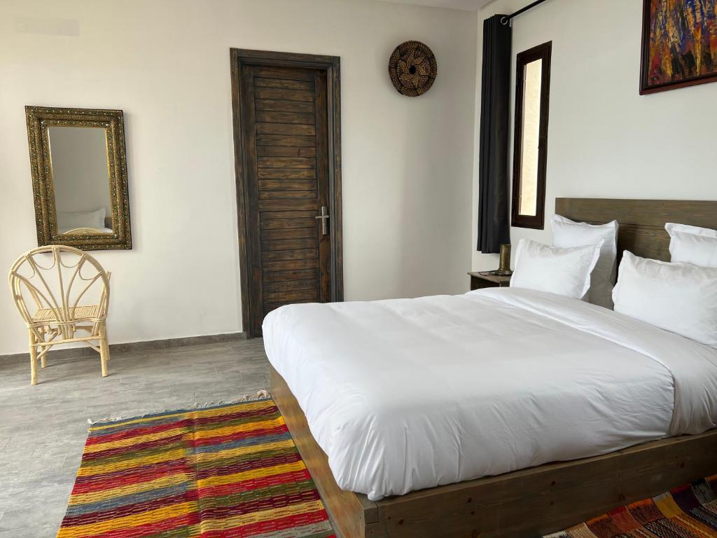 Postel nebo postele na pokoji v ubytování Dar Ayman Essaouira