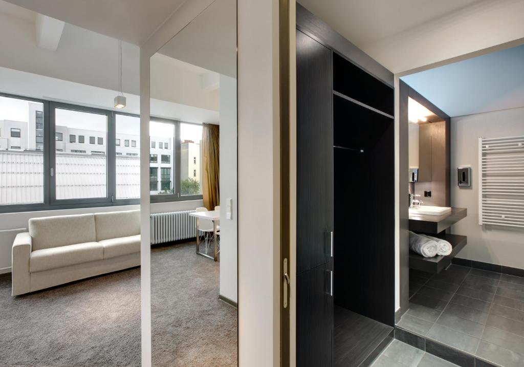 Postel nebo postele na pokoji v ubytování Aspria Berlin Ku'damm Sport & Spa