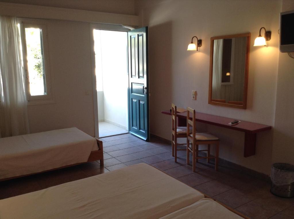 Postel nebo postele na pokoji v ubytování Rose Bay Hotel